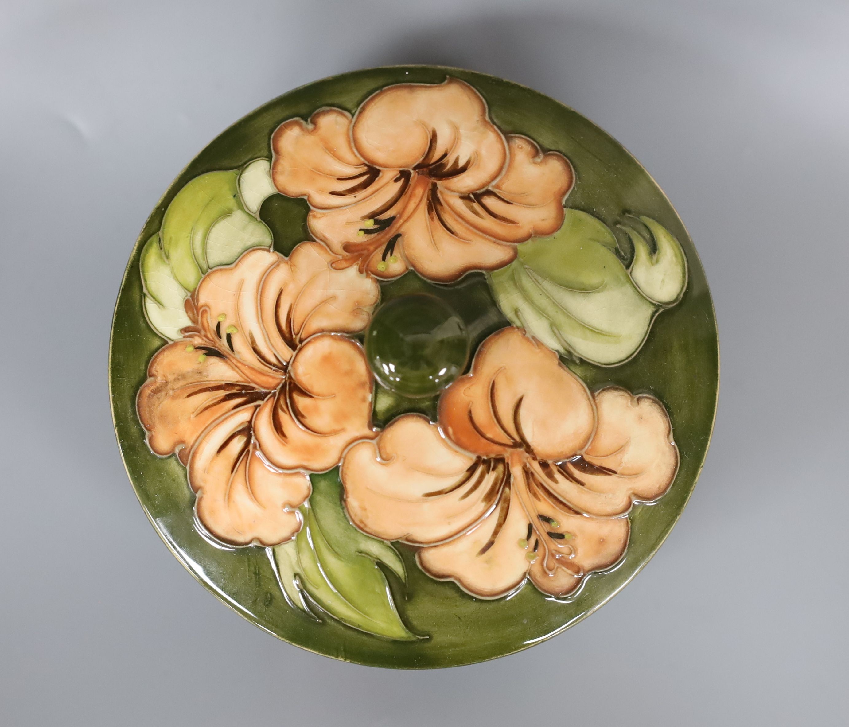 A Moorcroft powder bowl and cover, Hibiscus pattern, 15cm diam.